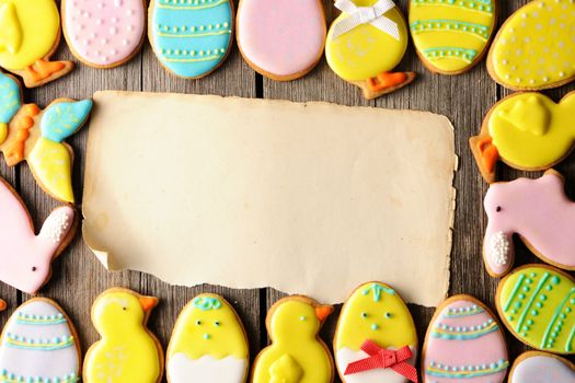 Easter homemade gingerbread cookie over wooden table