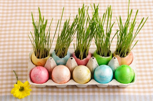 Colored easter eggs on table