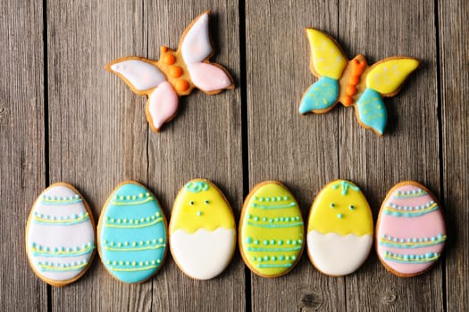 Easter homemade gingerbread cookie over wooden table