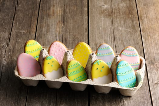 Easter homemade gingerbread cookie over wooden table