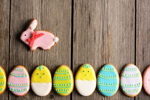 Easter homemade gingerbread cookie over wooden table