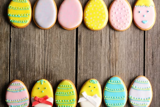 Easter homemade gingerbread cookie over wooden table