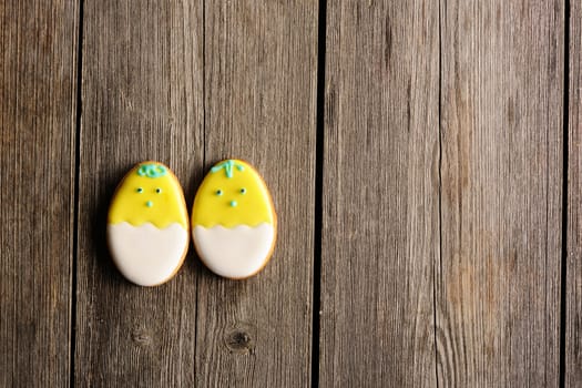 Easter homemade gingerbread cookie over wooden table