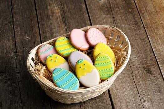 Easter homemade gingerbread cookie over wooden table