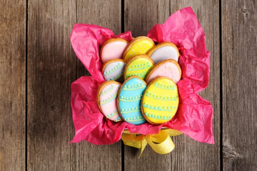 Easter homemade gingerbread cookie over wooden table