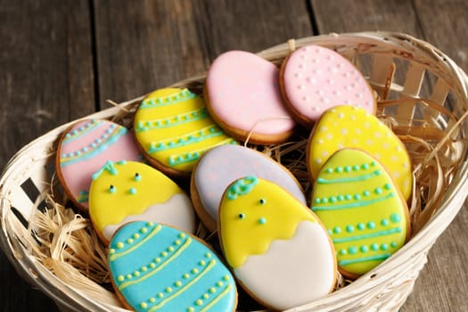 Easter homemade gingerbread cookie over wooden table