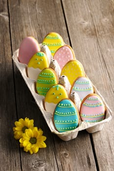 Easter homemade gingerbread cookie over wooden table