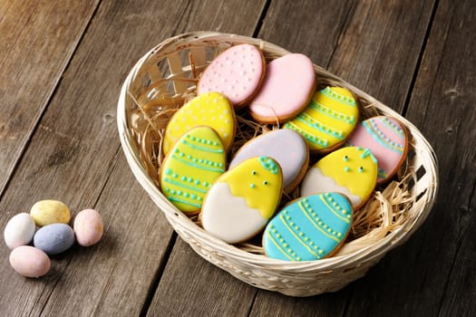 Easter homemade gingerbread cookie over wooden table