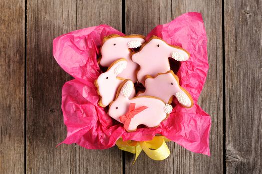 Easter homemade gingerbread cookie over wooden table