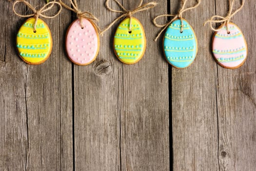 Easter homemade gingerbread cookie over wooden table