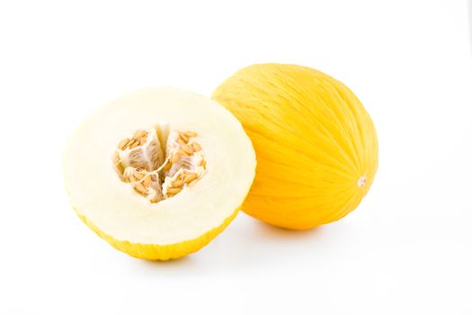Fresh yellow melon slices isolated on white background, fruit