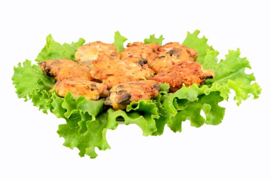 Cutlets minced on leaves of salad