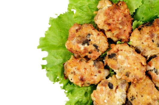 Cutlets minced on leaves of salad