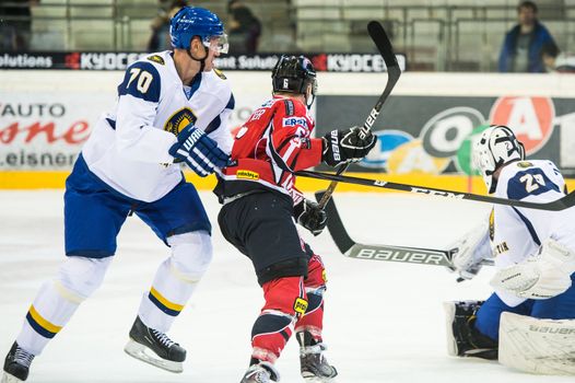 VIENNA - FEB 3: International hockey game between Austria and Kazakhstan. Big size difference between Raphael Rotter and Alexei Litvinenko on February 3, 2013 at Albert Schultz Halle in Vienna, Austria.