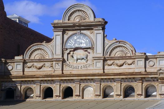 frontage of a building of Kalgoorlie in Australia with low-reliefs