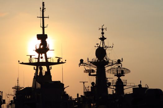 battleship with sunset behind