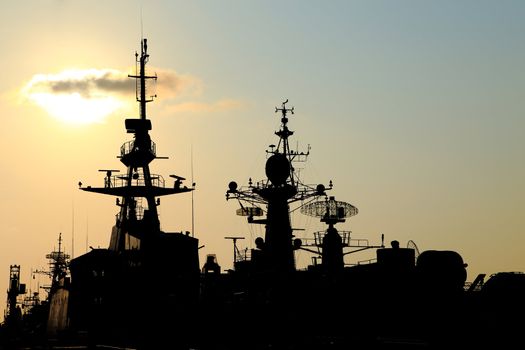 battleship with sunset behind