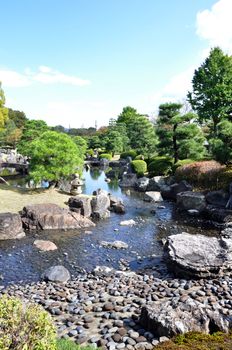 Garden with pond in japanese style in Nijo castle, Kyoto, Japan