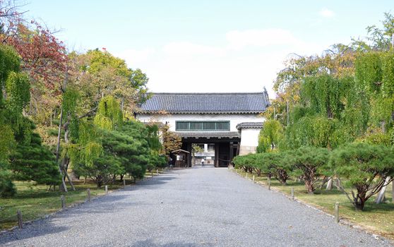 Secondary gate to the Kyoto Nijo castle gardens. Nijo Castle is a flatland castle located in Kyoto, Japan. 