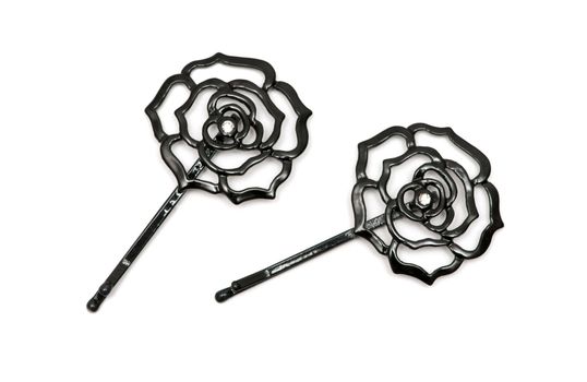 black hair clips isolated on a white background