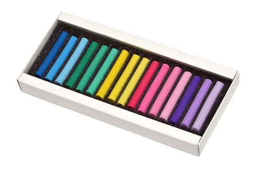 Color chalk in box isolated