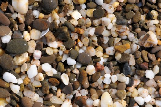 background made of a closeup of a pile of pebbles