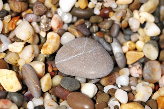 background made of a closeup of a pile of pebbles