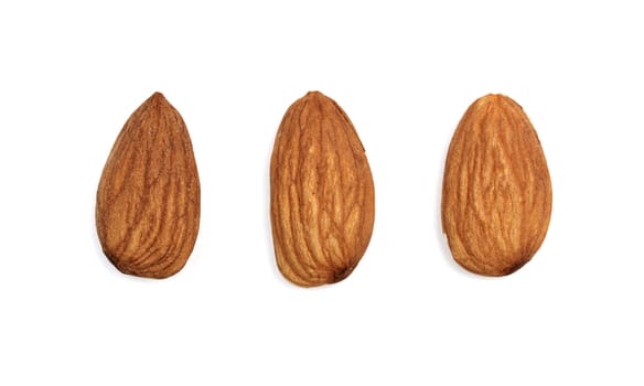 Almonds isolated on white background. Close up view.