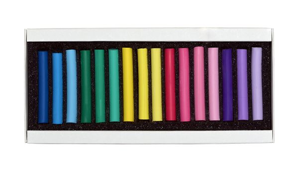 Color chalk in box isolated