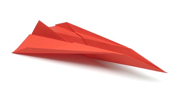 Paper airplane on white background