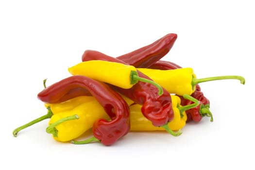 red and yellow peppers on white background