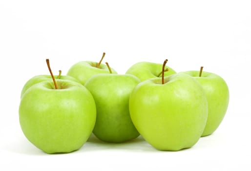 fresh seven green apples isolated on a white background 
