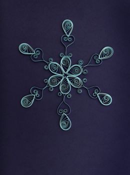 Christmas background with paper snowflake.
