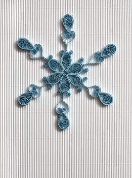 Christmas background with paper snowflake.