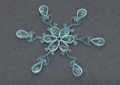 beautiful paper snowflake, on gray background