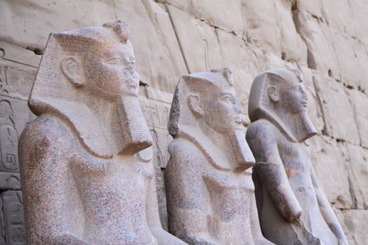 Three ancient stone granite statues in Egypt, Pharaohs