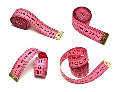 Pink measuring tape isolated on white