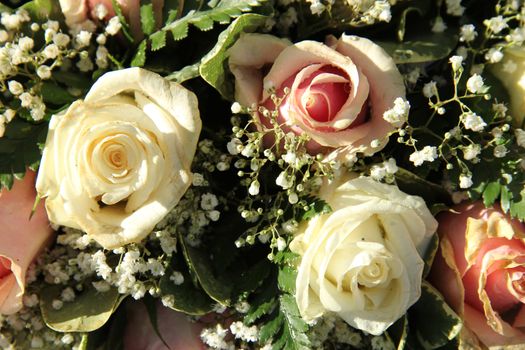 Wedding flowers in pink and white roses and gypsophila