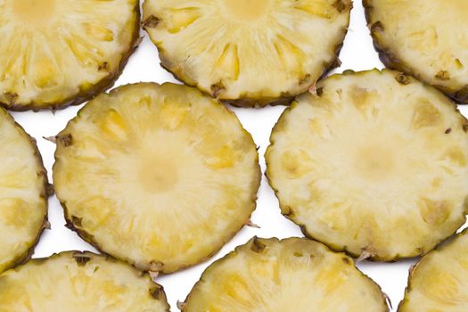 Pineapple slices background isolated on white background, fresh fruits