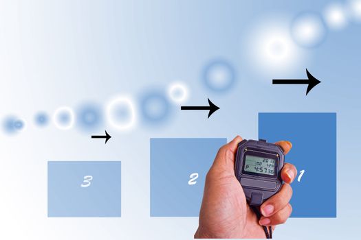 hand holding stopwatch against a abstract background
