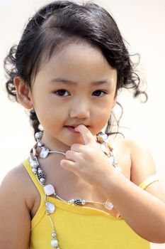 Portrait of the beautiful small Asian girl. Indonesia. Java