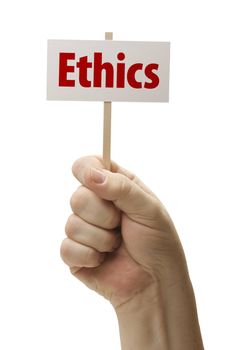 Ethics Sign In Male Fist Isolated On A White Background.