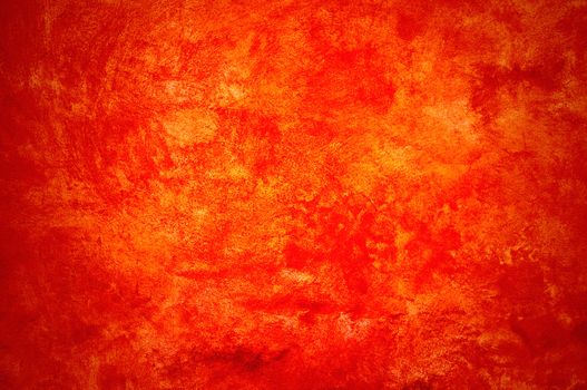 Orange wall with brush strokes.