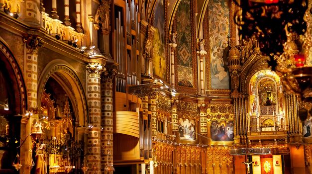 Basilica Inside Monestir Monastery of Montserrat, Barcelona, Catalonia, Spain.  Founded in the 9th Century, destroyed in 1811 when French invaded Spain. Rebuilt in 1844 and now a Benedictine Monastery.  Placa de Santa Maria