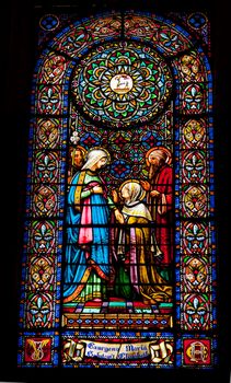 Stained glass Mary Elizabeth Joseph at Monestir Monastery of Montserrat, Barcelona, Catalonia, Spain.  Founded in the 9th century, destroyed in 1811 when French invaded Spain. Rebuilt in 1844 and now a Benedictine monastery.  Placa de Santa Maria.