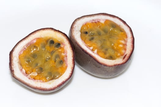 cut passion fruit on white background