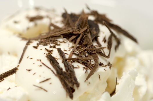 Dessert with cream and chocolate shaving