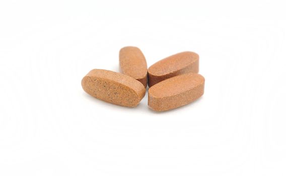 multi-vitamin supplements on white background