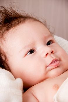 sweet little baby infant toddler on white  blanket in basket at home