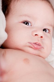 sweet little baby infant toddler on white  blanket in basket at home